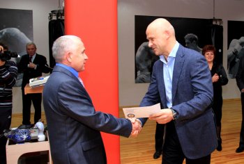 Украинской Национальной федерации таиландского бокса подарили миллион гривен и двухкомнатную квартиру