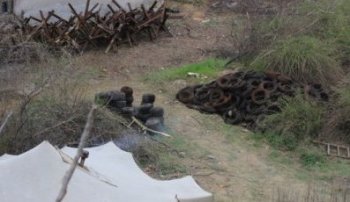 Неизвестные лица в военной форме создали под Одессой военный лагерь (фото) 
