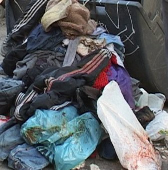 В мусорном контейнере на улице  Гайдара нашли окровавленный труп мужчины (фото)