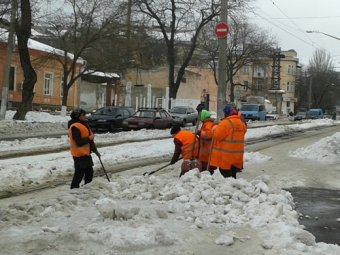 Как борются с последствиями снегопада в Приморском районе (фото)