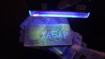 За взятку в 10 тысяч гривен задержан налоговик из Одесской области (фото)