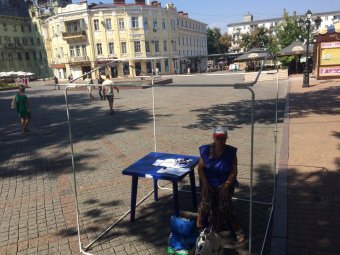Активистов Оппозиционного блока опять атаковали неизвестные в камуфляже (фото)