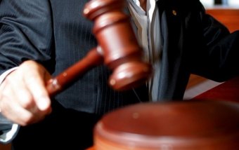 На скамье подсудимых - одессит, продававший чужие квартиры по поддельным документам (фото)
