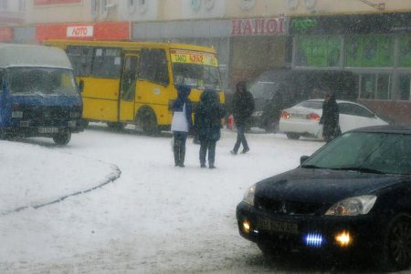 Одессу заметает снегом (фоторепортаж)