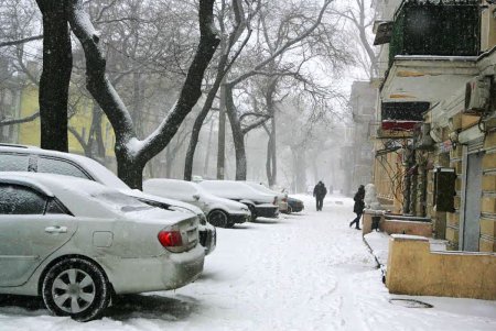 Одессу заметает снегом (фоторепортаж)