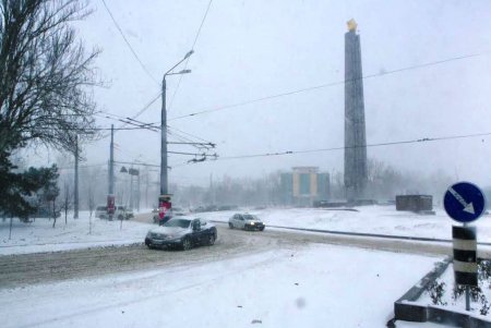 Одессу заметает снегом (фоторепортаж)