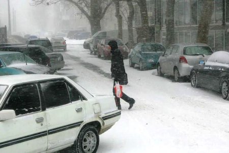 Одессу заметает снегом (фоторепортаж)