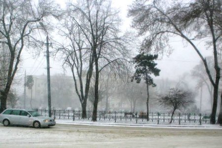 Одессу заметает снегом (фоторепортаж)