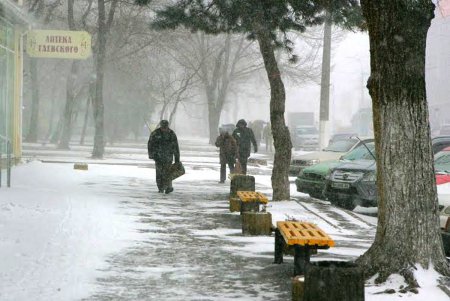 Одессу заметает снегом (фоторепортаж)
