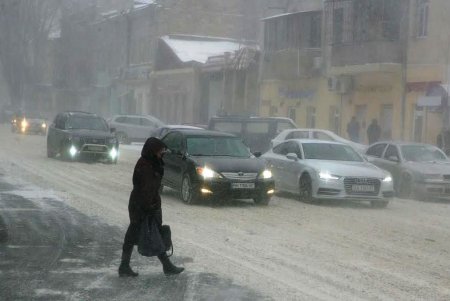 Одессу заметает снегом (фоторепортаж)
