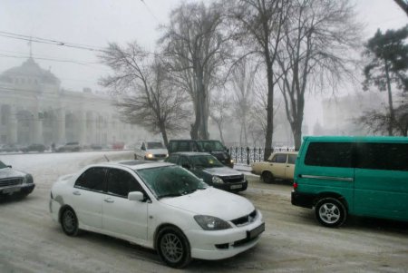 Одессу заметает снегом (фоторепортаж)