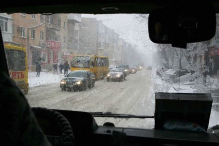 Одессу заметает снегом (фоторепортаж)