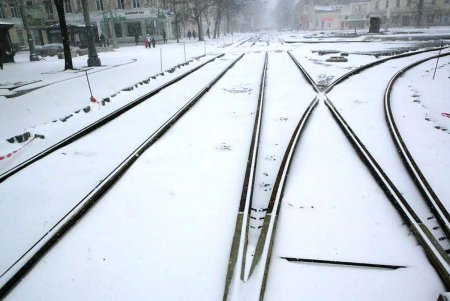 Одессу заметает снегом (фоторепортаж)