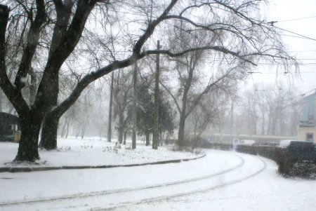 Одессу заметает снегом (фоторепортаж)