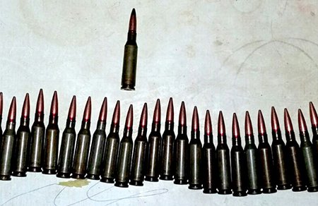 В Одессе у подозреваемых в тяжких преступлениях изъяли оружие и патроны (фото)