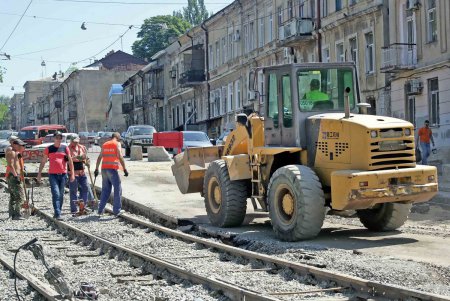  Дорожные мучения жителей поселка Котовского близки к окончанию (фоторепортаж)