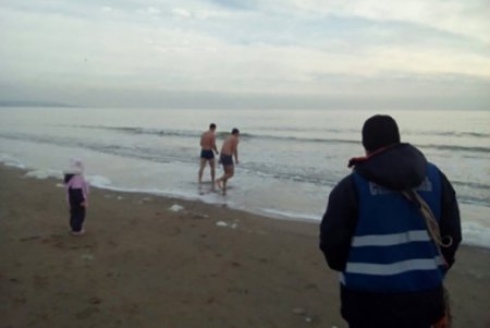 Семь тысяч одесситов окунулись в освященные воды Черного моря (фото)