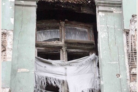 Самый многострадальный одесский дом узнал имя своего неотложного «доктора» (фоторепортаж)