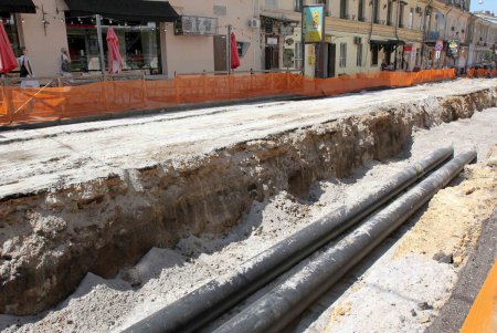 На улице Ланжероновской продолжаются работы по замене теплотрассы (фоторепортаж)