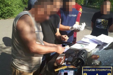 Депутат и сотрудник военкомата попались на взятке в Арцизском районе (фото)
