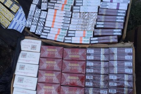 В результате обысков в Одесской области правоохранители изъяли 4 тонны табака и 170 тысяч  пачек сигарет (фото, видео)
