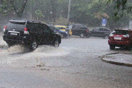 Августовский ливень в Одессе (фоторепортаж)