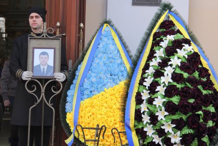 В Одессе попрощались со спасателем, погибшим в результате пожара на Троицкой (фоторепортаж)