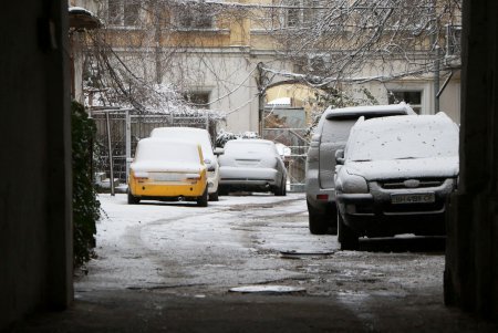 Город под снежными хлопьями (фоторепортаж)