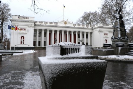 Город под снежными хлопьями (фоторепортаж)