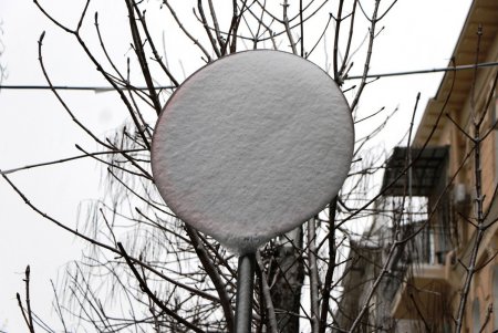 Город под снежными хлопьями (фоторепортаж)