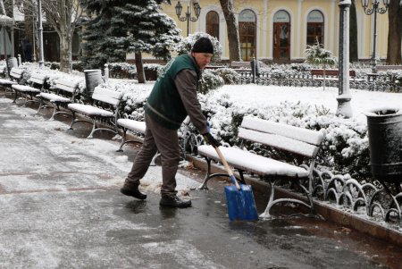 Город под снежными хлопьями (фоторепортаж)