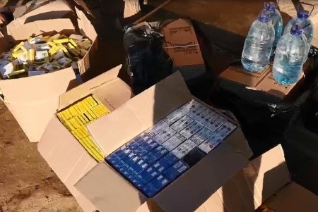 В частных домах Раздельнянского района нашли 15 тысяч пачек сигарет и более 250 литров нелегального алкоголя (фото, видео)