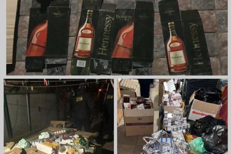 Почти 30 обысков, 2,5 тонны спиртного и десятки тысяч пачек сигарет: в Раздельнянском районе разоблачили подпольный алкоцех (фото, видео)