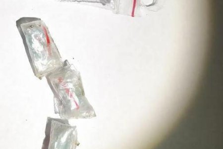 Дилер пытался избавиться от наркотиков на глазах у одесских патрульных (фото)