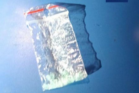Дилер пытался избавиться от наркотиков на глазах у одесских патрульных (фото)