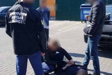 Задержан полицейский, который требовал ежемесячные взятки у предпринимателя (фото)