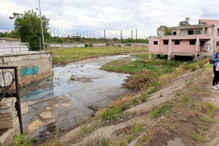 Дождь на Балковской: буферный пруд прошел испытание (фоторепортаж) 
