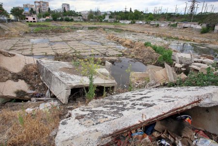 Дождь на Балковской: буферный пруд прошел испытание (фоторепортаж) 