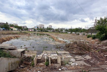 Дождь на Балковской: буферный пруд прошел испытание (фоторепортаж) 