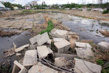 Дождь на Балковской: буферный пруд прошел испытание (фоторепортаж) 