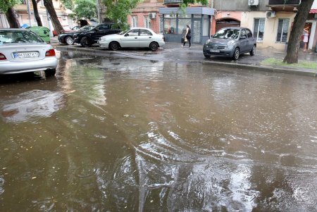 Дождь в большом городе (фоторепортаж)