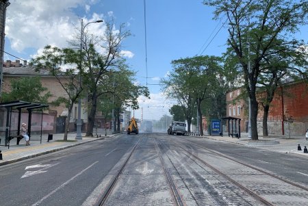 Уже завершающий слой асфальта укладывают на спуске Маринеско (фото, видеокомментарий)
