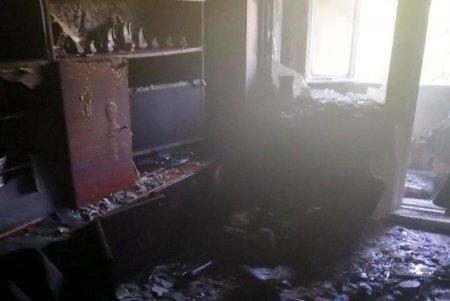 В Черноморске горела квартира: двух пенсионеров спасли