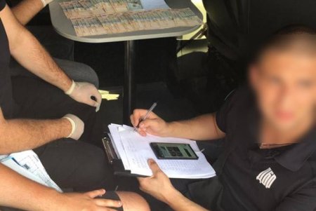 В Одесской области полицейский требовал 1500 долларов, обещая не привлекать к ответственности подозреваемого в грабеже (фото)