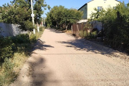 На поселке Котовского, Слободке и Кривой Балке капитально ремонтируют дорожное покрытие улиц (фото)