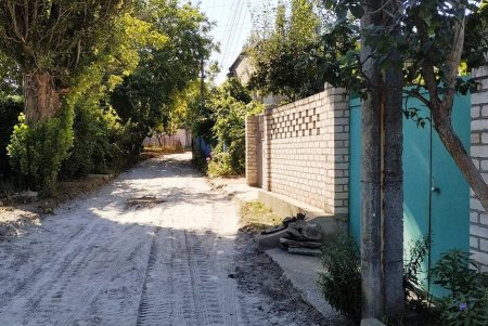 На поселке Котовского, Слободке и Кривой Балке капитально ремонтируют дорожное покрытие улиц (фото)