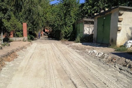 На поселке Котовского, Слободке и Кривой Балке капитально ремонтируют дорожное покрытие улиц (фото)