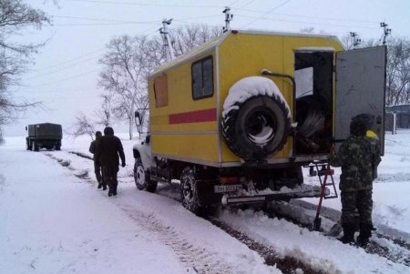Нацгвардейцы помогают коммунальщикам исправлять последствия непогоды в Одесской области (фото)