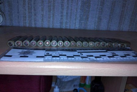 Одессит нашел в комнате пасынка 20 боеприпасов и две коробки с наркотиками