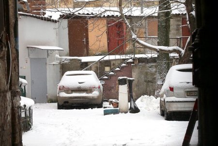 Одессу снова накрыло белой пеленой (фоторепортаж)